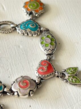 Retired Brighton charm bracelet featuring colorful enamel flower and heart charm